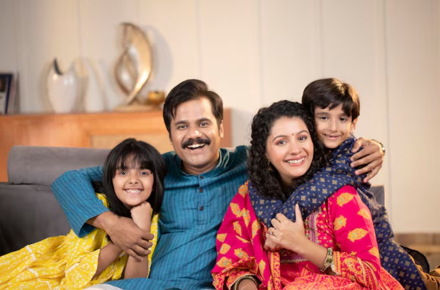 Happy family reviewing their financial plan